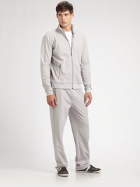 A sporty, ultra-urban jacket is defined by a full-zip along the front and two more on the pockets. Zip front Logo embroidery Side zip pockets About 28 from shoulder to hem 52% cotton/48% polyester Machine wash Imported A sporty, ultra-urban jacket is defined by a full-zip along the front and two more on the pockets. Zip front Logo embroidery Side zip pockets About 28 from shoulder to hem 52% cotton/48% polyester Machine wash Imported