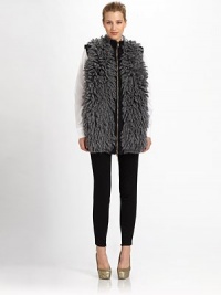 Warm, textural mohair faux-fur, tailored in a long, chic silhouette.Stand collarSleevelessZip frontAbout 28 from shoulder to hem61% mohair/31% polyamide/8% woolDry cleanMade in Italy of imported fabricModel shown is 5'9½ (176cm) wearing US size 4. 