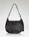 This Isabella Fiore shoulder bag styles your look boho-luxe, crafted of lived-in leather with a slouchy, chic shape.