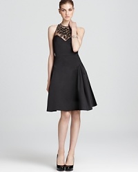Exude elegant soirée style with this embellished Milly dress. A sheer neckline adds allure. Exude elegant soirée style with this embellished Milly dress. A sheer neckline adds allure.