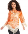 Reinvent your look with Cha Cha Vente's statement-making top, featuring a bold, bright print and fringe trim.