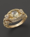 Oval canary crystal stone accented with heart-shaped diamond prongs and textured band in 18K gold. By Judith Ripka.