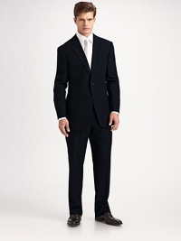 The essential black suit, timeless and elegant in 100% wool crepe. Made in Italy. Dry clean.JACKETTwo button silhouette with notch lapel Chest welt pocket Besom pockets Button cuffs Side vents Fully lined About 30 from shoulder to hemPANTSFlat front, belt loops Zip fly Lined to knee Quarter top pockets Side pockets Button back welt pockets Unfinished hemPlease note: Alterations are available at all Saks Fifth Avenue stores. 