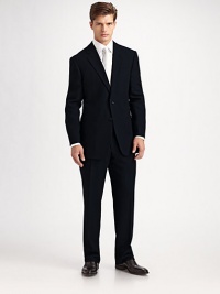 The essential black suit, timeless and elegant in 100% wool crepe. Made in Italy. Dry clean.JACKETTwo button silhouette with notch lapel Chest welt pocket Besom pockets Button cuffs Side vents Fully lined About 30 from shoulder to hemPANTSFlat front, belt loops Zip fly Lined to knee Quarter top pockets Side pockets Button back welt pockets Unfinished hemPlease note: Alterations are available at all Saks Fifth Avenue stores. The essential black suit, timeless and elegant in 100% wool crepe. Made in Italy. Dry clean.JACKETTwo button silhouette with notch lapel Chest welt pocket Besom pockets Button cuffs Side vents Fully lined About 30 from shoulder to hemPANTSFlat front, belt loops Zip fly Lined to knee Quarter top pockets Side pockets Button back welt pockets Unfinished hemPlease note: Alterations are available at all Saks Fifth Avenue stores.