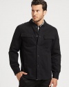 Featuring a classic button-down shirt silhouette, this stand-collar cotton jacket offers laid-back style.Stand collarSnap frontFront pocketsStylish back yokeAbout 28 from shoulder to hemCottonMachine washImported of domestic fabric