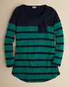 Crafted in soft jersey, this striped tunic creates a striking contrast with a solid yoke, shoulders and chest pocket.