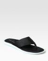 Embossed logo thong upper comfortably completes this flip flop sandal with contrast sole.Rubber soleImported