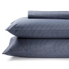 Surround yourself with a deep admiral blue hue laced with a lilac dot pattern on this Calvin Klein sheet set. The flat sheet, fitted sheet and two pillowcases can effortlessly blend in, or add charming contrast to your traditional decor.