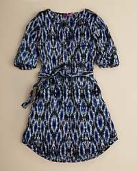 An abstracted diamond print embellishes this tribal-inspired dress that cinches with an attached tie belt for a breezily stylish vibe. An abstracted diamond print embellishes this tribal-inspired dress that cinches with an attached tie belt for a breezily stylish vibe.