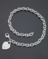 A stunning chain ends with a simple heart charm on this versatile necklace by GUESS. Logo at charm. Approximate length: 15 inches.