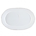 An effortless collection that transitions seamlessly from your kitchen to the table, these exceptional serving dishes solidify your presentation with down-to-earth elegance. Crafted in Tuscany from Italian stoneware, and featuring unique, rustic shapes with modern details, these pieces are built to last, both in terms of style and functionality.