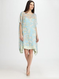 An ultra-mod sheath of graphic matte silk drapes elegantly from shoulder to hem.BoatneckDropped shouldersDolman sleevesAsymmetrical hemAbout 19 from natural waist95% silk/5% lycraDry cleanImportedModel shown is 5'9½ (176cm) wearing US size Small.OUR FIT MODEL RECOMMENDS ordering true size. An ultra-mod sheath of graphic matte silk drapes elegantly from shoulder to hem.BoatneckDropped shouldersDolman sleevesAsymmetrical hemAbout 19 from natural waist95% silk/5% lycraDry cleanImportedModel shown is 5'9½ (176cm) wearing US size Small.OUR FIT MODEL RECOMMENDS ordering true size.
