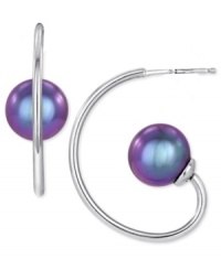 Majorica puts pearls on a pedestal in this pair of triple hoop earrings. Crafted from sterling silver, the earrings feature organic man-made pearls (10 mm) for added luster. Approximate drop: 1 inch.