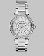 From the Parker Collection. Truly sparkle in this technical timepiece with Swarovski crystal accents. Quartz movementWater resistant to 10 ATMRound stainless steel case, 33mm (1.3) Swarovski crystal accented bezelSilvertone dialNumeric and Swarovski crystal hour markersThree multi-function sub-dialsSecond hand Stainless steel link braceletImported