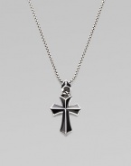A rayskin-textured cross, crafted in sterling silver with contrasting onyx inlay. Sterling silver Onyx Pendant, about 2 long Necklace, about 20 long Imported 
