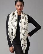 Skull patterned silk adds a hint of rocker chic to everything. Silk About 41 X 47 Dry clean Made in Italy