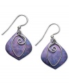 A laid-back look for the fashionable free spirit. Jody Coyote's vivid drop earrings features a bronze, purple patina design set in sterling silver. Approximate drop: 1-1/4 inches.