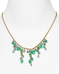 Alexis Bittar's gold and stone cluster necklace epitomizes modern accessorizing. It's layered style lend eclectic cool to both daytime basics or simple evening ensembles. Alexis Bittar's gold and stone cluster necklace epitomizes modern accessorizing. It's layered style lend eclectic cool to both daytime basics or simple evening ensembles.