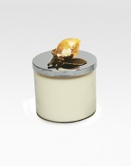 A vivid fragrance that celebrates the herbal and grassy heart of citrus with rich base notes of precious wood, sage, cardamom and clove. The glass jar is topped with a goldplated lemon on nickel-plated metal lid crafted by one of America's premier metalwork artists. From the Lemonwood CollectionSoy wax14.5 oz.5½H X 3¾ diam.Imported 