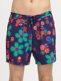 Bold floral print in quick-drying nylon trunks with easy drawstring waist for endless style and comfort.Drawstring tie waistSide slash pocketsInseam, about 4PolyamideMachine washImported Bold floral print in quick-drying nylon trunks with easy drawstring waist for endless style and comfort.Drawstring tie waistSide slash pocketsInseam, about 4PolyamideMachine washImported