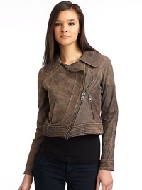 THE LOOKTopstitched collar, placket and hemAsymmetrical front zipperDual zip pocketsLong sleeves with banded cuffsTextured elbow patchesCenter back vent with snap closuresTHE FITAbout 19 from shoulder to hemTHE MATERIALLamb leatherFully linedCARE & ORIGINDry clean by a leather specialistImportedModel shown is 5'10½ (179cm) wearing US size Small. THE LOOKTopstitched collar, placket and hemAsymmetrical front zipperDual zip pocketsLong sleeves with banded cuffsTextured elbow patchesCenter back vent with snap closuresTHE FITAbout 19 from shoulder to hemTHE MATERIALLamb leatherFully linedCARE & ORIGINDry clean by a leather specialistImportedModel shown is 5'10½ (179cm) wearing US size Small.