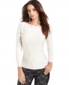A sprinkle of sequins adds a hint of glam to this GUESS sweater -- a hot layering piece!