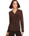 Add fierce flair to your fall look with this polished GUESS leopard-print blouse!