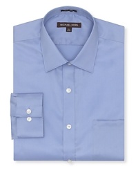 Long sleeve, non-iron solid shirt. A regular fitting, button front dress shirt with spread collar and adjustable barrel cuffs. Chest pocket at left chest.