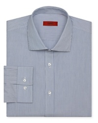 Classic and refined, this handsome HUGO dress shirt adds polish to your dress wardrobe. Classic and refined, this handsome HUGO dress shirt adds polish to your dress wardrobe.