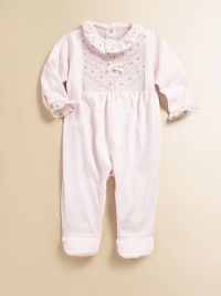 This footed, snap-back design in ultra soft cotton is finished with sweet ruffles, embroidery and a pretty smocked bodice.Ruffled crewneckLong sleeves with buttoned, ruffled cuffsBack snapsSmocked bodiceBottom snapsCottonMachine washImported Please note: Number of snaps may vary depending on size ordered. This footed, snap-back design in ultra soft cotton is finished with sweet ruffles, embroidery and a pretty smocked bodice.Ruffled crewneckLong sleeves with buttoned, ruffled cuffsBack snapsSmocked bodiceBottom snapsCottonMachine washImported Please note: Number of snaps may vary depending on size ordered.