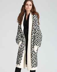 Layer on luxe style with this cozy, oversized Rachel Zoe cardigan in a classic jacquard check. Layer on luxe style with this cozy, oversized Rachel Zoe cardigan in a classic jacquard check.