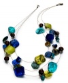 Inspired by the colorful artistry of Brasil, this Style&co. illusion necklace showcases blue and lime shells and wooden beads threaded from three delicate wires. Approximate length: 18 inches + 2-inch extender. Approximate drop: 6 inches.