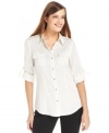 Calvin Klein's blouse is a classic silhouette that needs to be in your closet for everything from work to weekend wear!