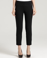 DKNY updates the classic workday pants with a skinny, cropped silhouette. Sleek pumps elongate for a feminine finish. DKNY updates the classic workday pants with a skinny, cropped silhouette. Sleek pumps elongate for a feminine finish.