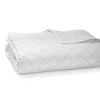 A cozy cotton quilt with contrasting gray-blue stitching. The DKNY Pure Inspiration collection elevates the simplest bedroom decor. A cozy cotton quilt with contrasting gray-blue stitching. The DKNY Pure Inspiration collection elevates the simplest bedroom decor.