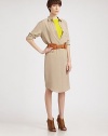 Minimal and chic, this supple silk design in tailored with classic shirt details and a loose, body-skimming fit.Shirt collarConcealed button frontLong sleeves with button cuffsBreast patch pocketInverted black pleatAbout 26 from natural waistSilkDry cleanMade in Italy of imported fabricModel shown is 5'10 (177cm) wearing US size 4. 