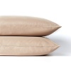 Effortless elegance. A versatile hue and high thread count distinguish these luxurious Donna Karan pillowcases.