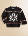 An intarsia-knit snowflake design adorns this timeless crewneck sweater for heritage style.Ribbed crewneckLong sleeves with turn-back cuffsShoulder buttonsCottonMachine washImported Please note: Number of buttons may vary depending on size ordered. 