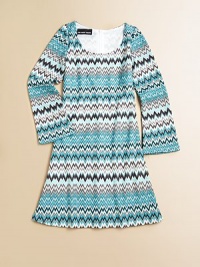 A colorful zig-zag print lends this cute tunic silhouette frock a little edge and attitude.ScoopneckLong wide sleevesBack zipperPolyesterHand washMade in the USA of imported fabric A colorful zig-zag print lends this cute tunic silhouette frock a little edge and attitude.ScoopneckLong wide sleevesBack zipperPolyesterHand washMade in the USA of imported fabric