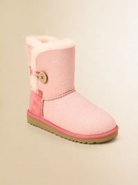 The classic UGG boot gets an update in denim to keep cute little feet warm and on-trend all season long.Logo button-and-loop closureSheepskin upperSheepskin liningMolded EVA sole is light and flexiblePadded insoleImported The classic UGG boot gets an update in denim to keep cute little feet warm and on-trend all season long.Logo button-and-loop closureSheepskin upperSheepskin liningMolded EVA sole is light and flexiblePadded insoleImported