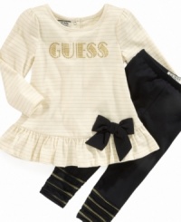 Ruffle, bows and sparkly print give this Guess tunic and leggings set a glam look she will love. Ruffle, bows and sparkly print give this Guess tunic and leggings set a glam look she will love.