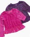 Make any outfit shine with this delightful sequin shirt with mesh sleeves from Jessica Simpson.