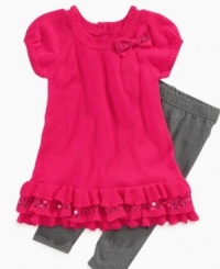 This very trendy sweater dress set by DKNY is sassy and sweet. She'll look adorable with the accompanying leggings. This very trendy sweater dress set by DKNY is sassy and sweet. She'll look adorable with the accompanying leggings.
