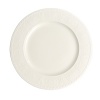 This collection of classic white, patterned dinnerware and serveware from Villeroy & Boch mixes seamlessly with a variety of table linen and flatware patterns.
