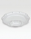 A beautiful stoneware server is crafted with elegant curves to bring rustic detail and irresistibly romantic European charm to a dinner or party. From the Berry & Thread CollectionCeramic stoneware12½ diam.Dishwasher- & microwave-safeImported
