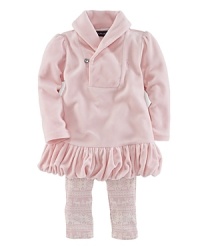 An essential soft velour set includes a shawl-collar tunic and a Nordic-inspired printed legging for a timeless heritage look and extra warmth. An essential soft velour set includes a shawl-collar tunic and a Nordic-inspired printed legging for a timeless heritage look and extra warmth.