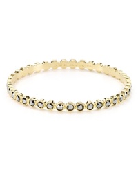 Twinkling hematite colored stones orbit around this gleaming MARC BY MARC JACOBS bangle. It's so spot on.