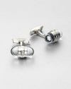 Signature cuff links, finished in platinum highlighted by a floating embossed emblem stars.PlatinumAbout 1 diam.Imported