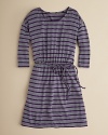 A bold stripe and braided belt accent this simple dress.