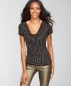 A soft cowl neckline and bead-studded sequins make an exciting combination on INC's alluring top.